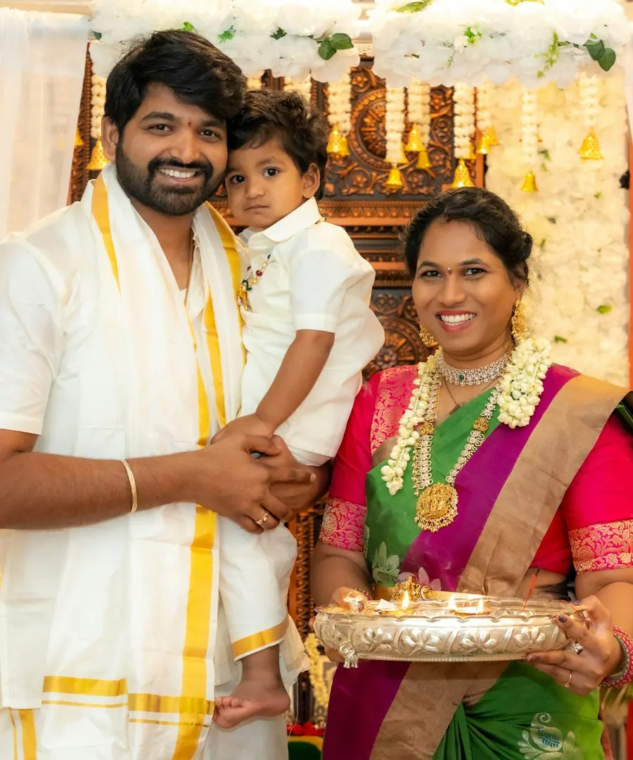 Family celebrating a griha pravesh in their new home